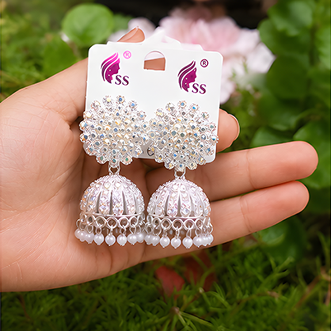 Radiant Silver-Plated Sparkling Crystal Floral Studded Jhumka Earrings with Pearl Hangings